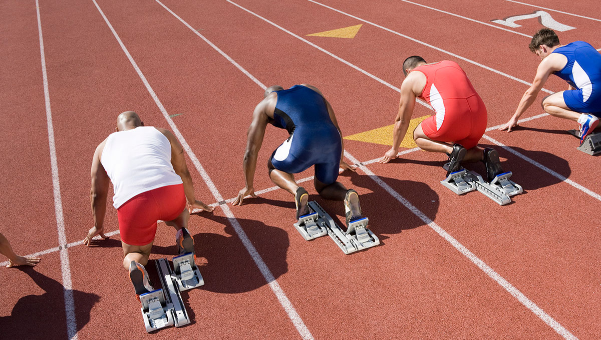 Athletes ready to run, high angle view