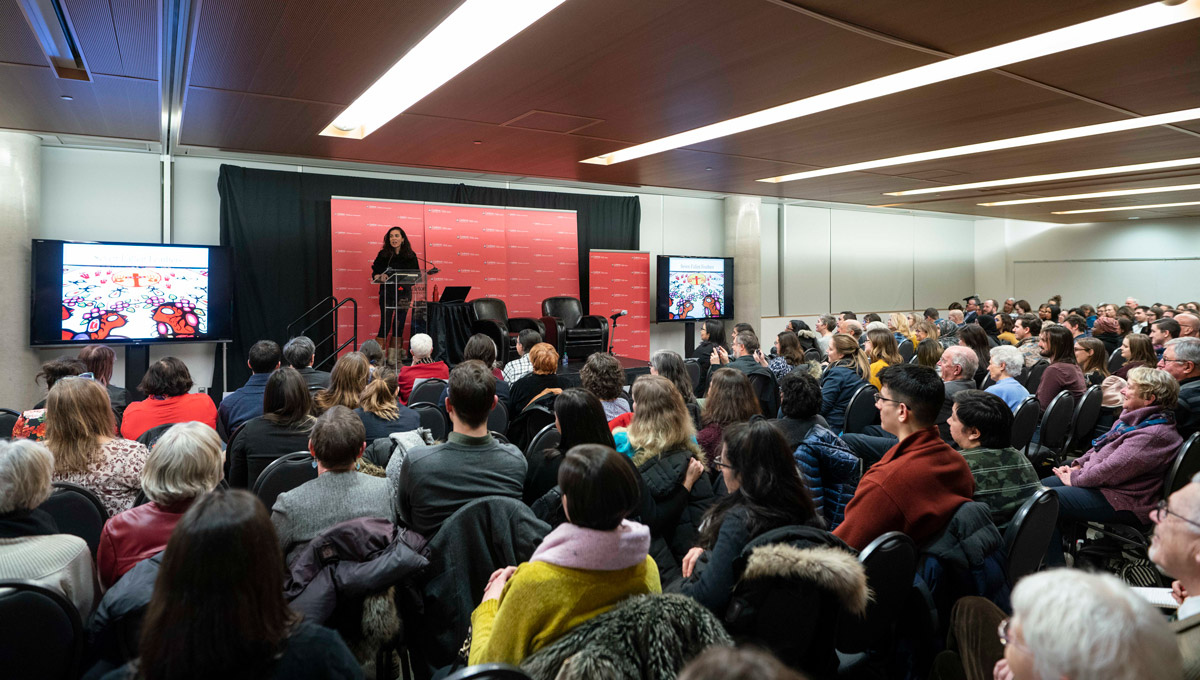 Tanya Talaga speaks about Tanya Talaga on Seven Fallen Feathers in front of a large crowd at the annual Kesterton Lecture in February 2019.