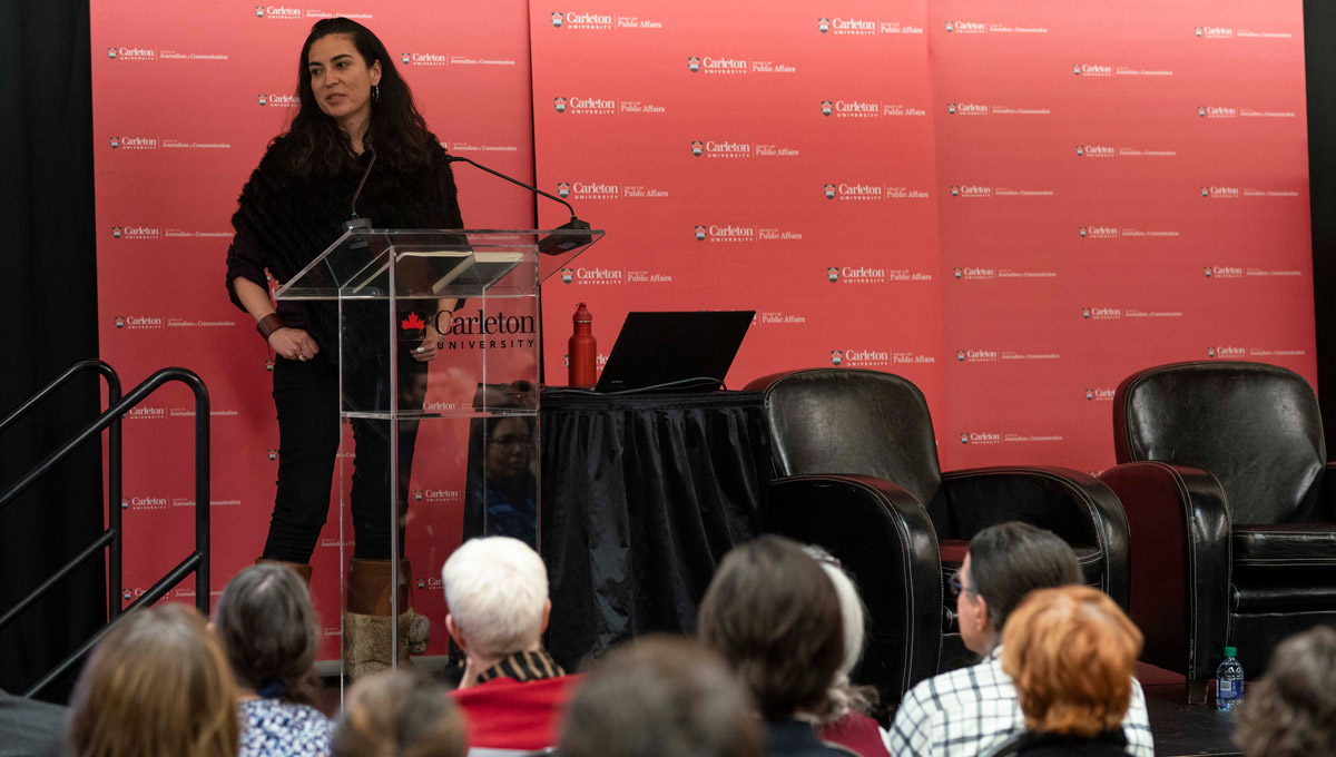 Tanya Talaga speaks about Tanya Talaga on Seven Fallen Feathers in front of a large crowd at the annual Kesterton Lecture in February 2019.