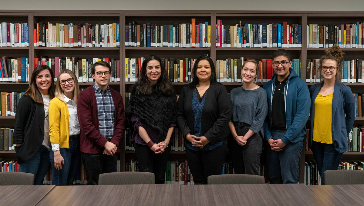 Tanya Talaga, APTN's Francine Compton and student journalists. Tanya Talaga Seven Fallen Feathers in front of a large crowd at the annual Kesterton Lecture in February 2019.