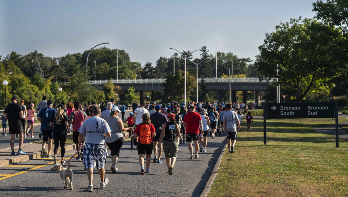 Runners on Colonel By Drive participate in the 2018 Terry Fox Run, one of the many Throwback homecoming events that took place in September.